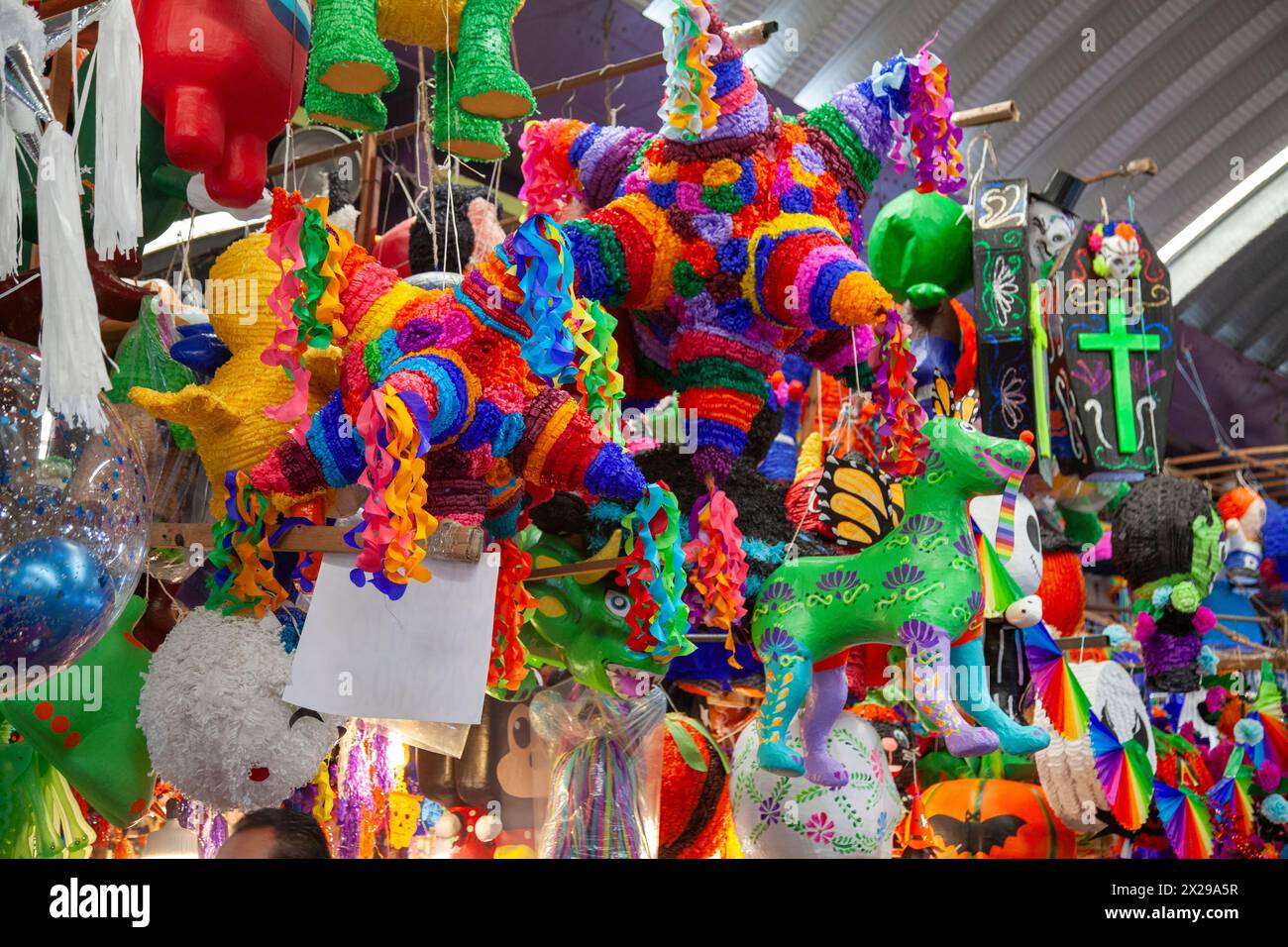 Pinata Dolls and Festive Merchandise for Sale at Jamaica Market in mexico City, Mexico Stock Photo