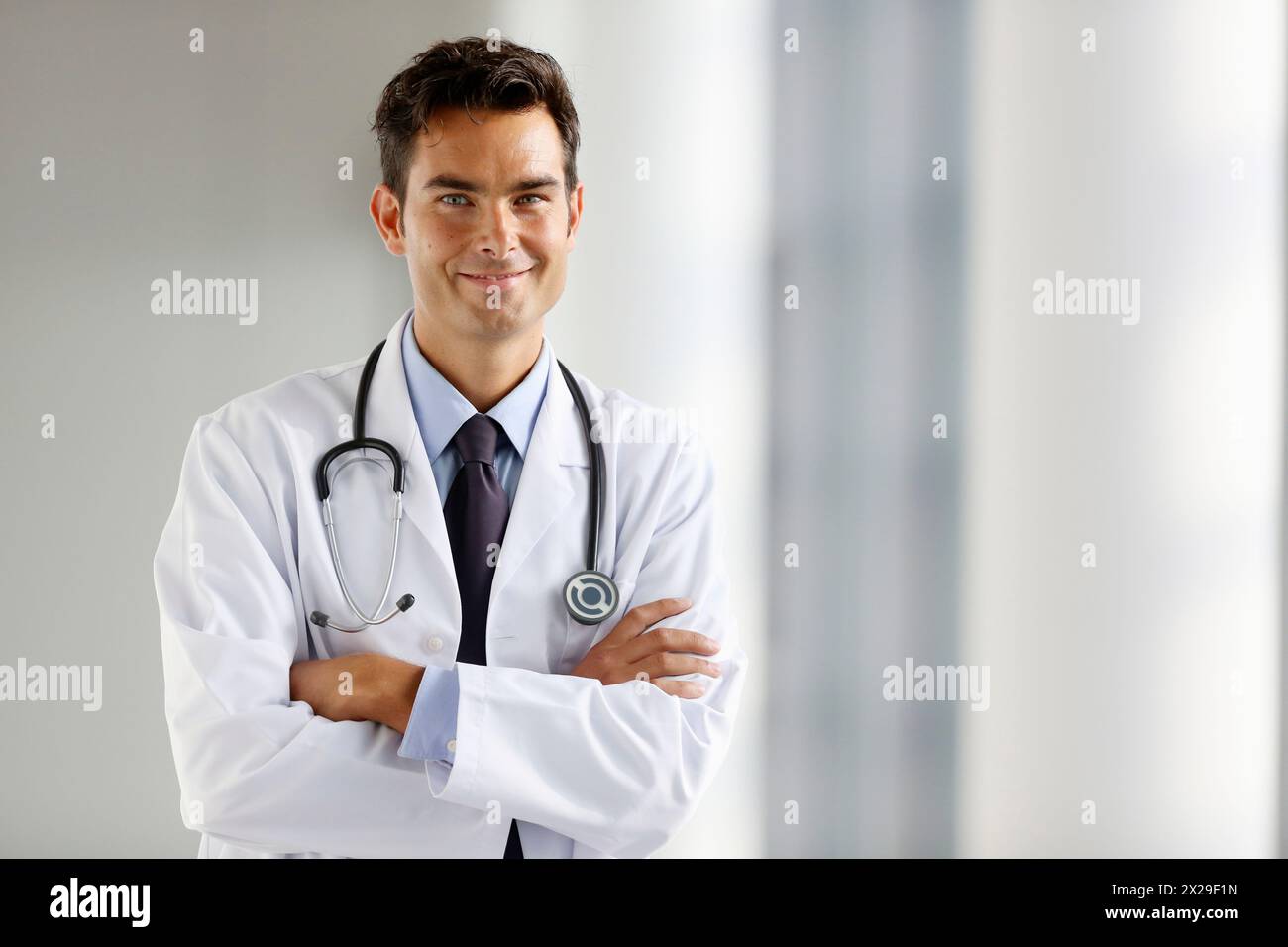 Doctor in black tie stethoscope hi-res stock photography and images - Alamy