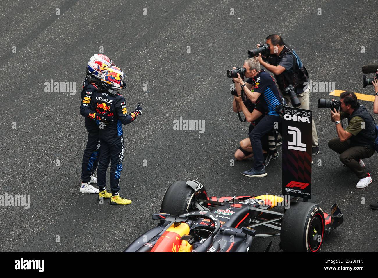 VERSTAPPEN Max (ned), Red Bull Racing RB20, portrait PEREZ Sergio (mex), Red Bull Racing RB20, portrait celebration during the Formula 1 Lenovo Chinese Grand Prix 2024, 5th round of the 2024 Formula One World Championship from April 19 to 21, 2024 on the Shanghai International Circuit, in Shanghai, China Stock Photo