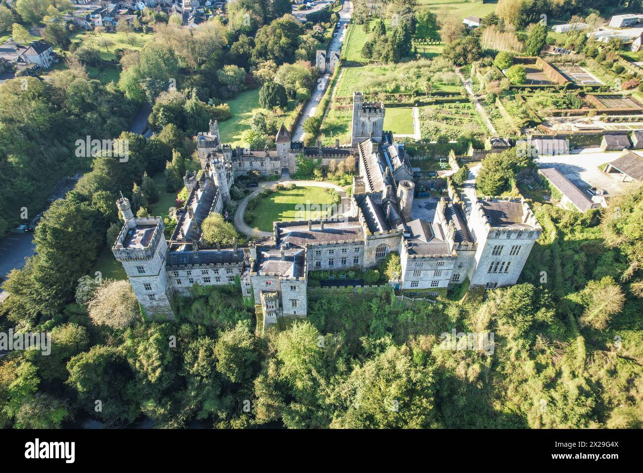 Behold Lismore Castle in County Waterford, Ireland, as if viewed through the eyes of an eagle, capturing every intricate detail of its historic grande Stock Photo