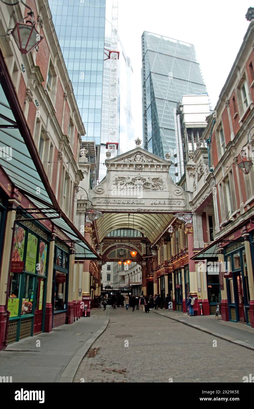 Entrance to Leadenhall Market with Modern Buildings in the Background, City of London, London, UK Stock Photo