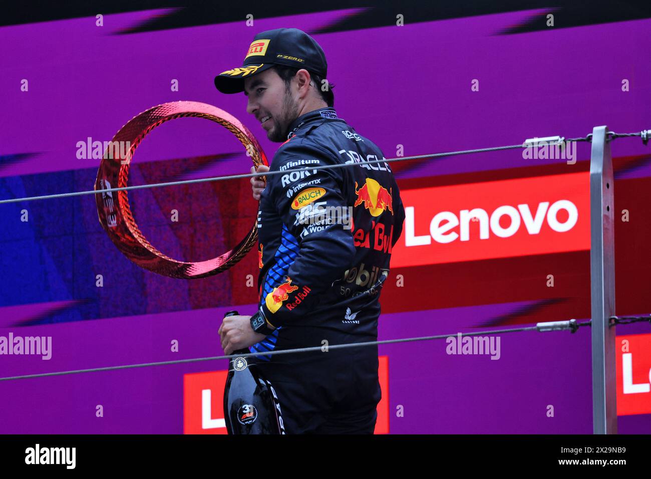 Shanghai, China. 21st Apr, 2024. Sergio Perez (MEX) Red Bull Racing celebrates his third