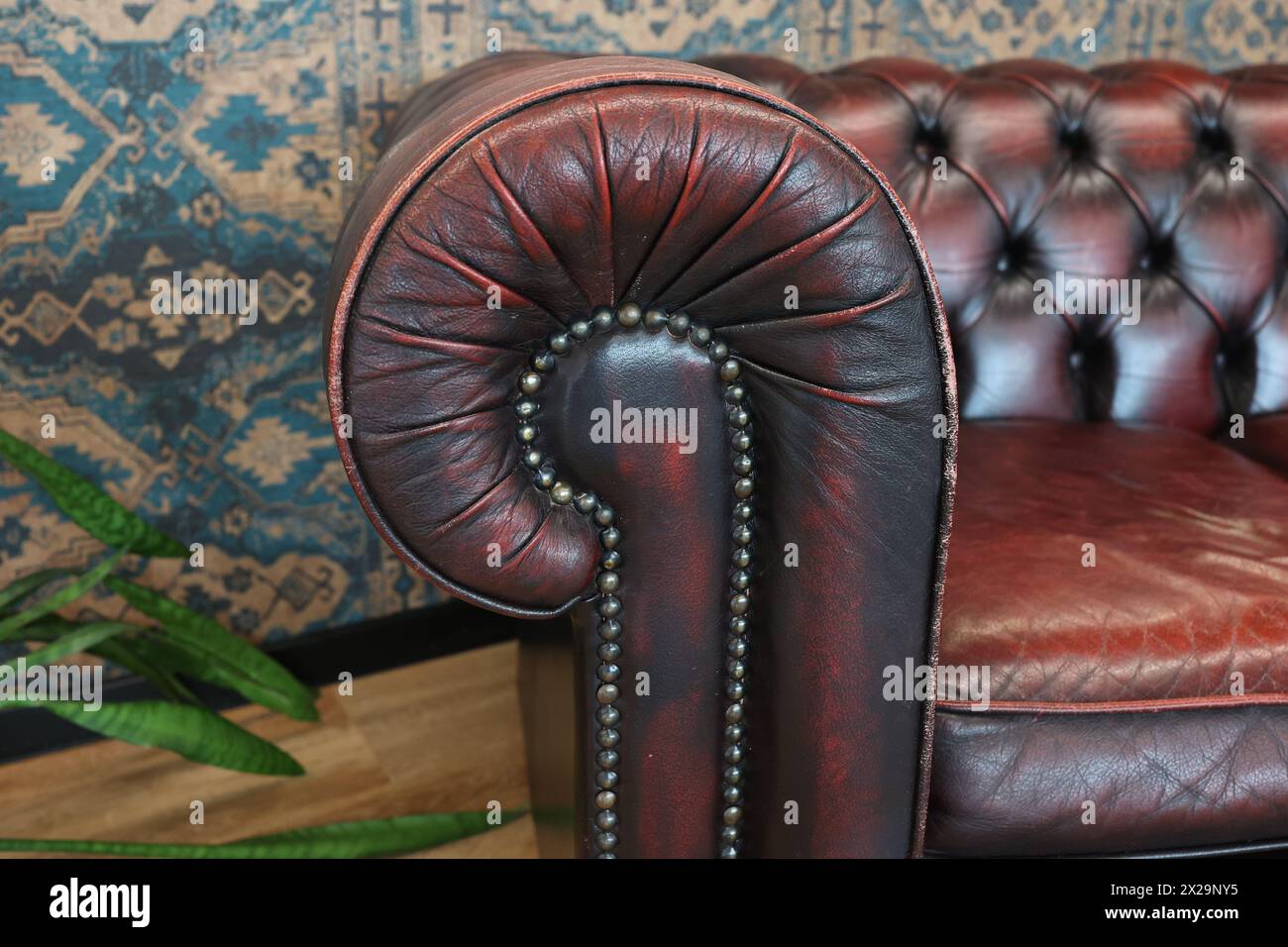 Fragment of an old leather sofa Stock Photo