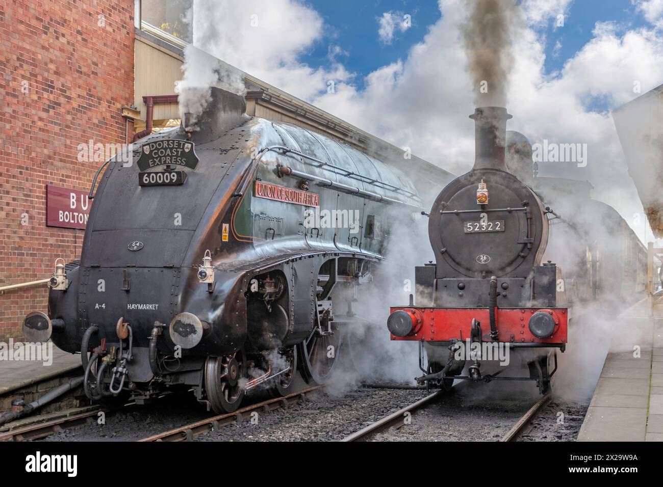 60009 Union Of South Africa LNER class A4 4488 Preserved steam locomotive built in (1937) and L&YR 52322 steam locomotive built in (1895) Stock Photo