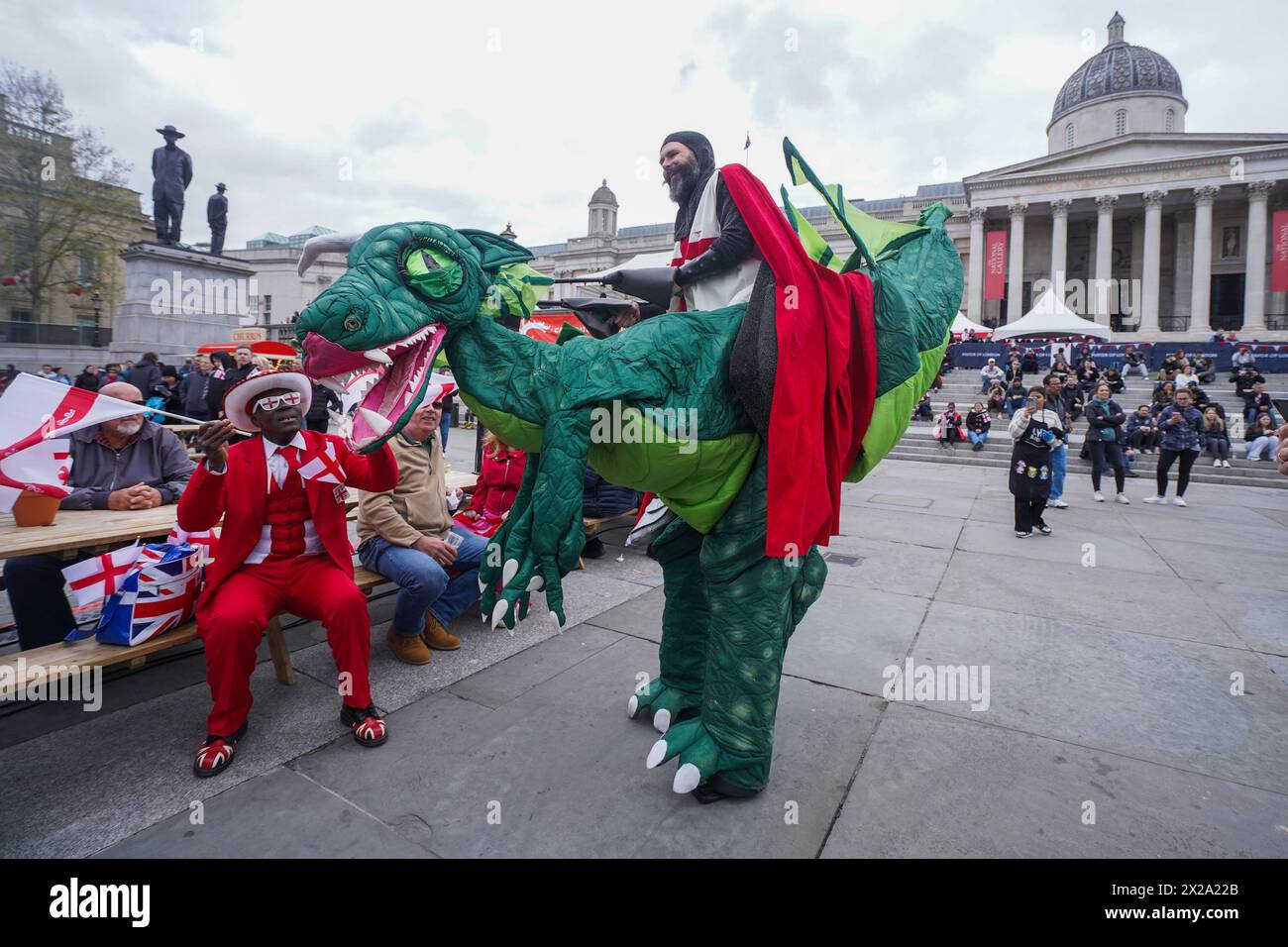 London 21 April 2024 .A man dressed as Saint George riding an inflatable dragon  takes part in   Saint George's Day celebrations in  Trafalgar Square Credit: amer ghazzal/Alamy Live News Stock Photo