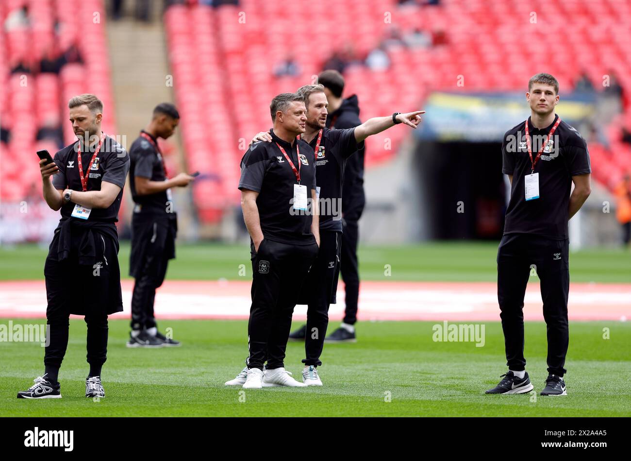 Coventry City players and staff inspect the pitch ahead of the Emirates FA Cup semi-final match at Wembley Stadium, London. Picture date: Sunday April 21, 2024. Stock Photo