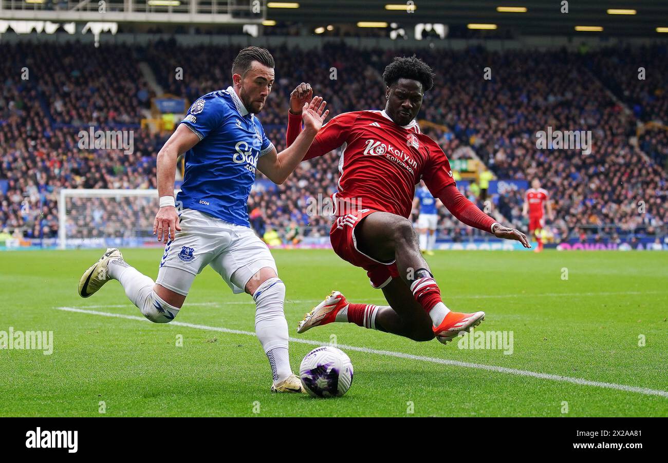 Everton’s Jack Harrison in action against Nottingham Forest's Ola Aina during the Premier League match at Goodison Park, Liverpool. Picture date: Sunday April 21, 2024. Stock Photo