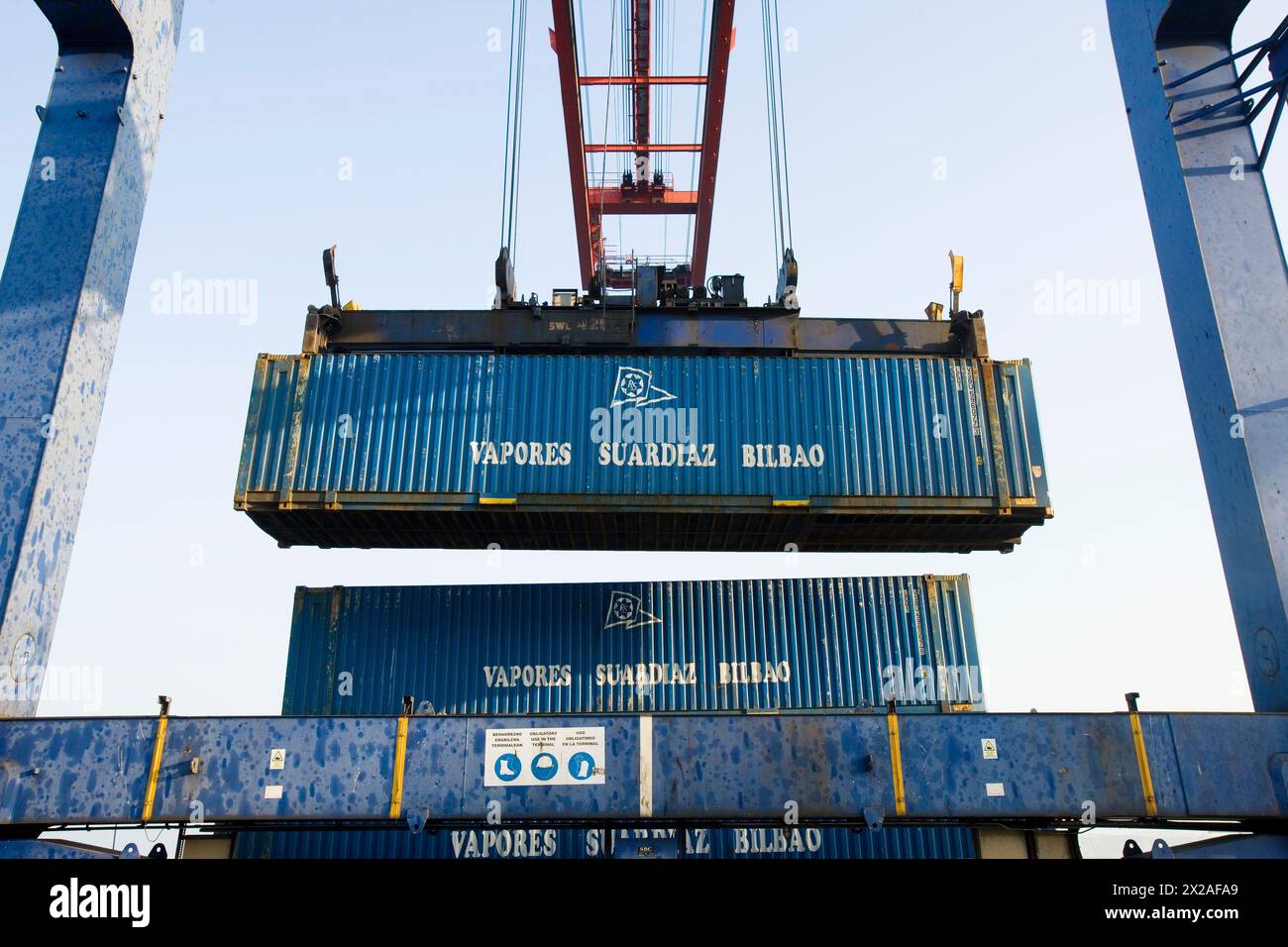 Loading cargo containers in ship, Port of Bilbao, Santurtzi. Biscay, Euskadi, Spain Stock Photo