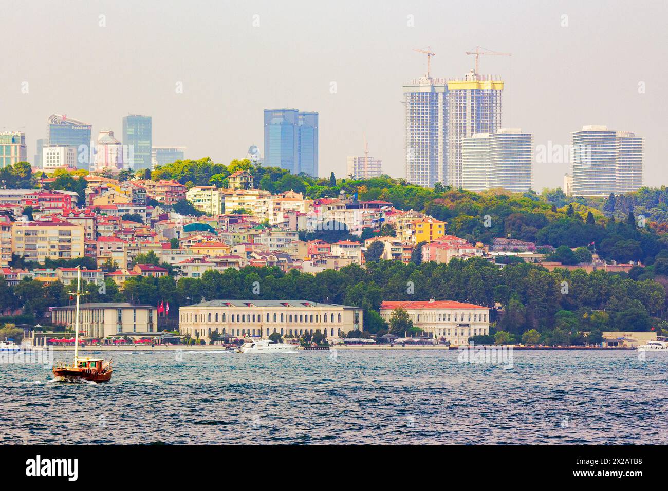 istanbul, turkey - 18 aug, 2015: construction of skyscrapers in the center of the old city in progress. architecture development near the shore of bos Stock Photo