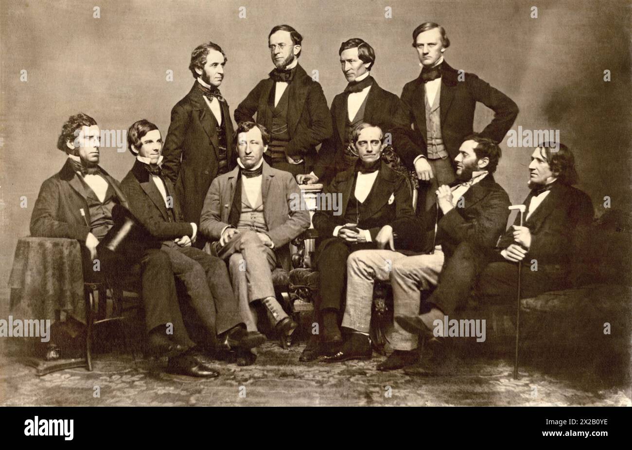 Jonathan Mason Warren was a Boston medical doctor, believed to have been the first to administer anesthesia to a child during surgery. He was the son of John Collins Warren - in this photo J. M. Warren (sitting, third from right) with other members of the Boston Society for Medical Improvement, about 1850 Stock Photo