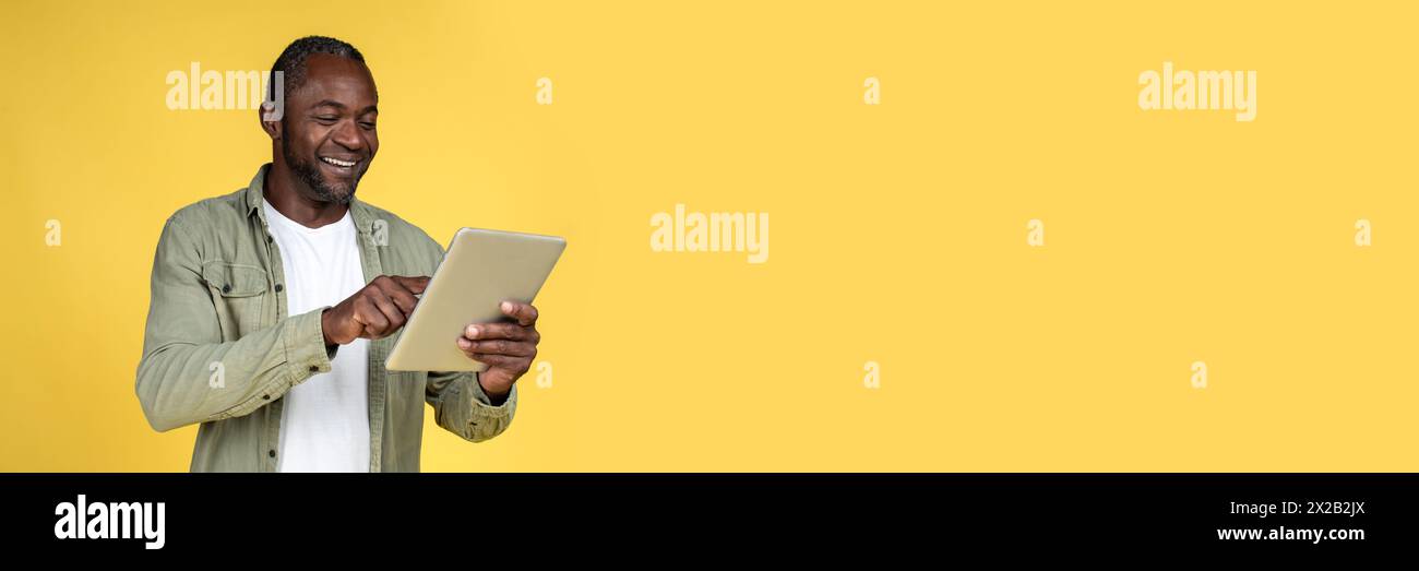 Handsome black man typing hi-res stock photography and images - Alamy