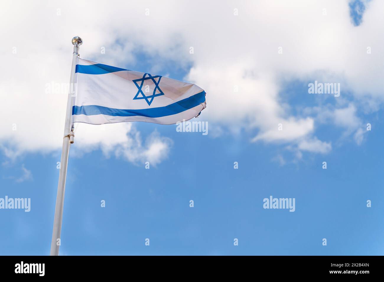 Flag of Israel The national flag of the State of Israel on blue sky ...