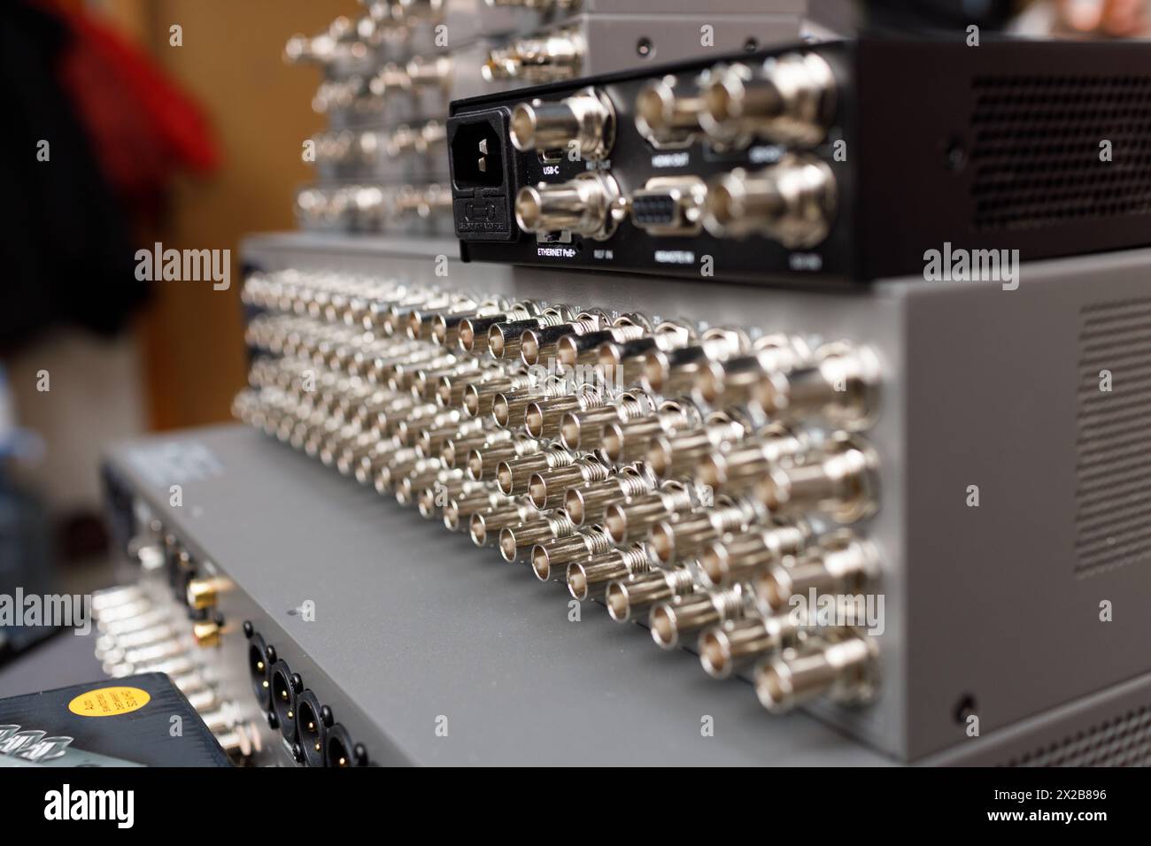 Commutation panel of telecommunication video switcher broadcast for TV channel translation back view Stock Photo