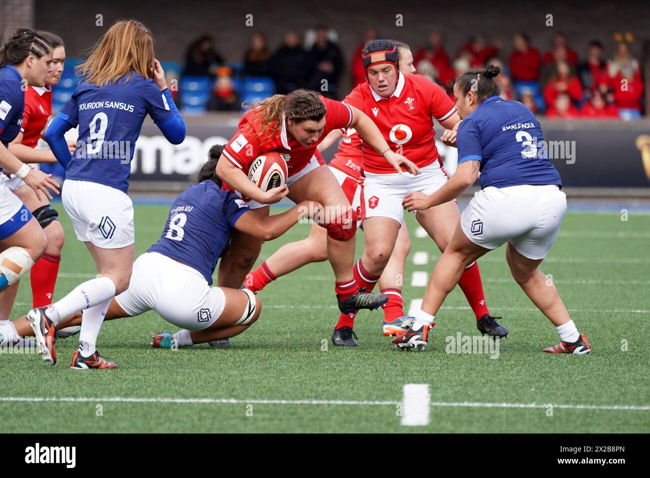 Cardiff, Wales. 21st Apr, 2024. Gwenllian Pyrs (Wales) is tackled by TEANI FELEU (France).  Women's six nations, 21 Apr 2024, Cardiff Arms Park,  Credit Alamy Live News/ Penallta Photographics Credit: Penallta Photographics/Alamy Live News Stock Photo