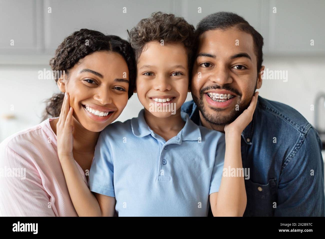 Portrait of a smiling african american family Stock Photo - Alamy