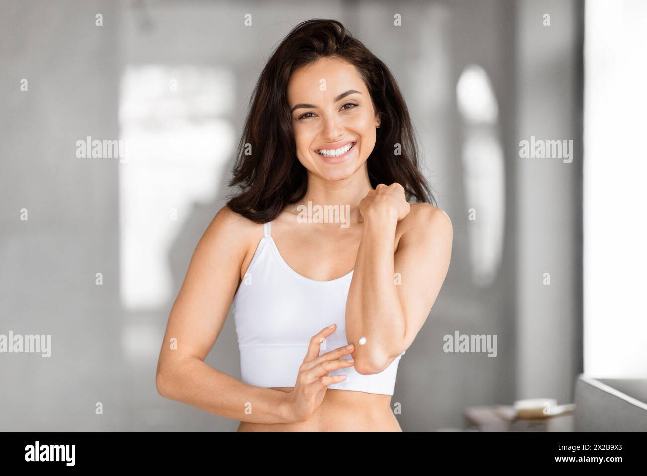 White tank top woman hi-res stock photography and images - Alamy