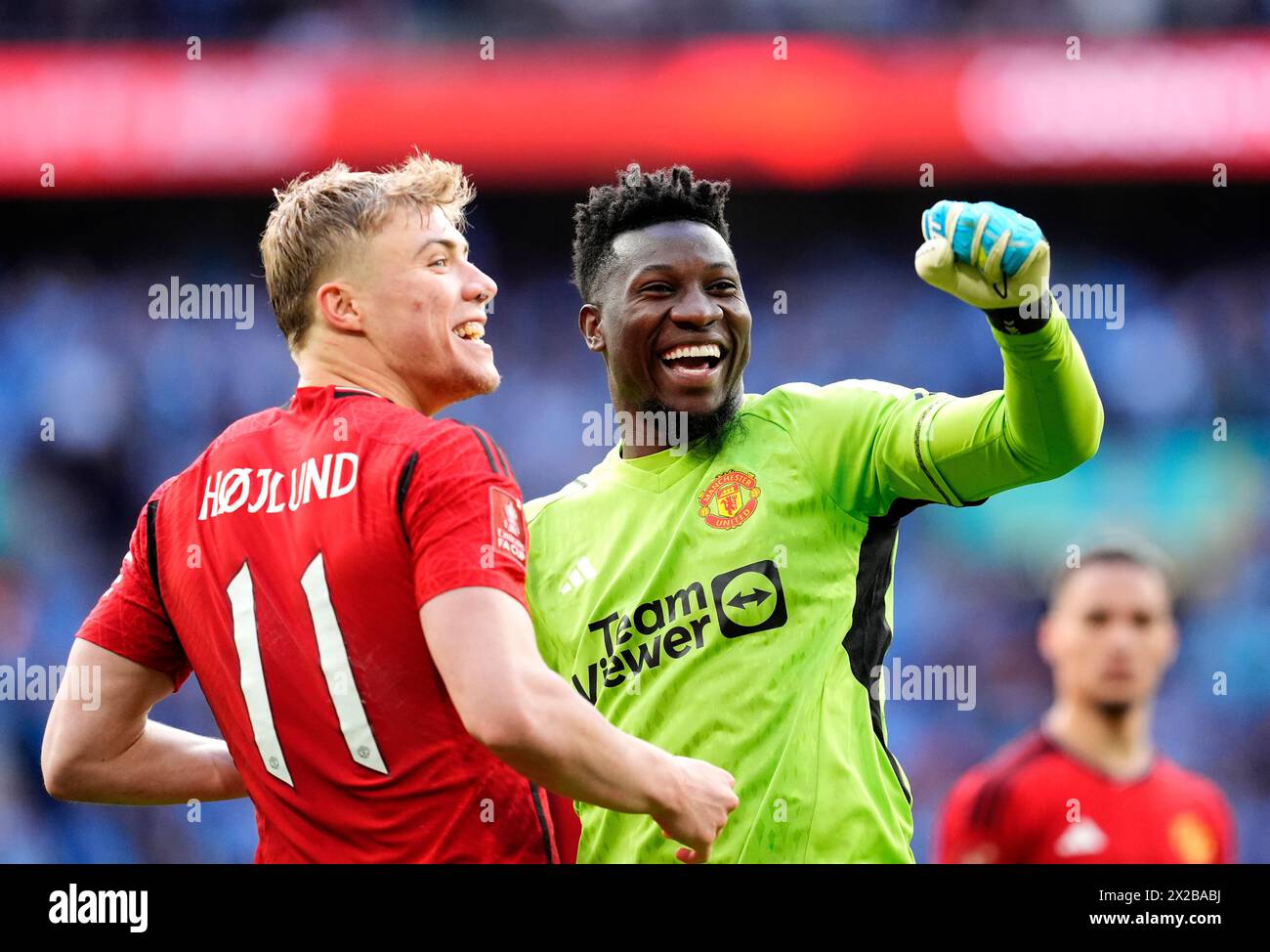Manchester United's Rasmus Hojlund (left) and goalkeeper Andre Onana celebrate at the end of the Emirates FA Cup semi-final match at Wembley Stadium, London. Picture date: Sunday April 21, 2024. Stock Photo