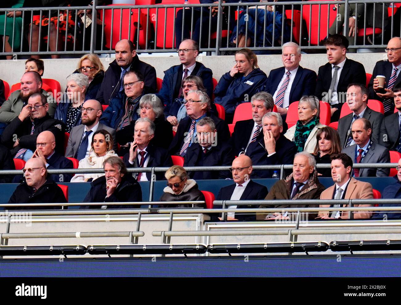 Manchester United owner Avram Glazer (bottom left), Jim Ratcliffe and Dave Brailsford (front row) and Jason Wilcox with David Gill (second row) during the Emirates FA Cup semi-final match at Wembley Stadium, London. Picture date: Sunday April 21, 2024. Stock Photo