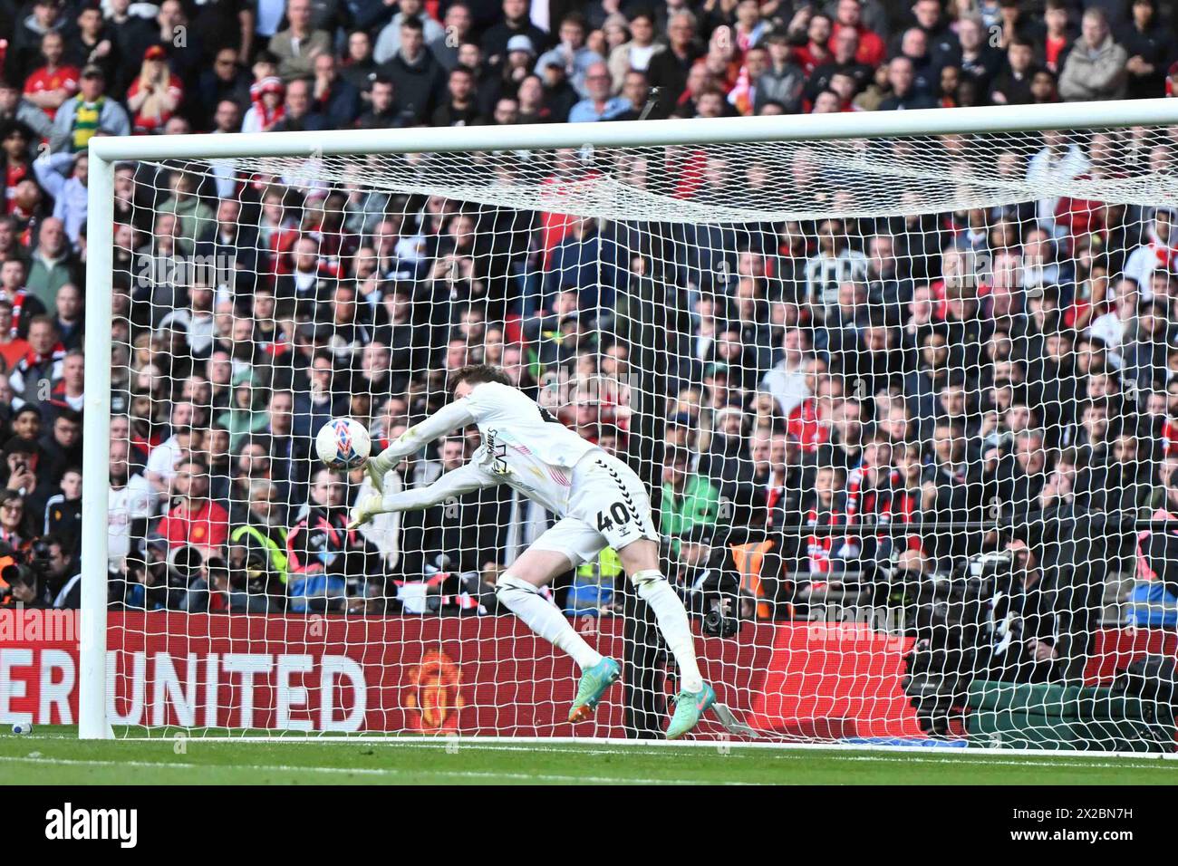 Wembley Stadium, London on Sunday 21st April 2024. Goalkeeper Bradley Collins (40 Coventry City) saves Casemiro (18 Manchester United) penalty during the FA Cup Semi Final match between Coventry City and Manchester City at Wembley Stadium, London on Sunday 21st April 2024. (Photo: Kevin Hodgson | MI News) Credit: MI News & Sport /Alamy Live News Stock Photo