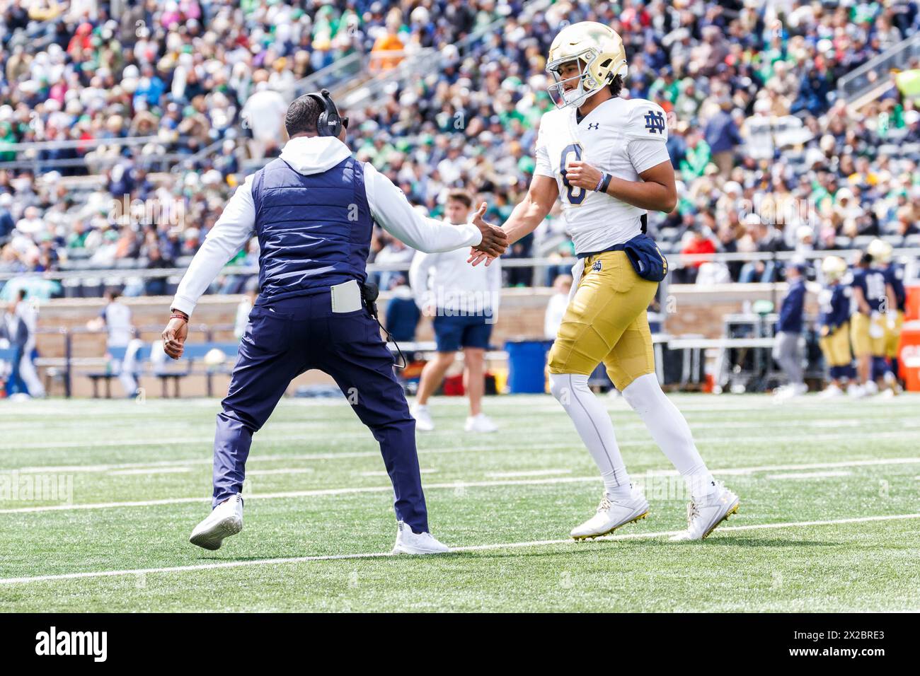 South Bend, Indiana, USA. 20th Apr, 2024. Notre Dame running backs coach Deland McCullough and Notre Dame quarterback Kenny Minchey (8) during the Notre Dame Annual Blue-Gold Spring football game at Notre Dame Stadium in South Bend, Indiana. John Mersits/CSM/Alamy Live News Stock Photo