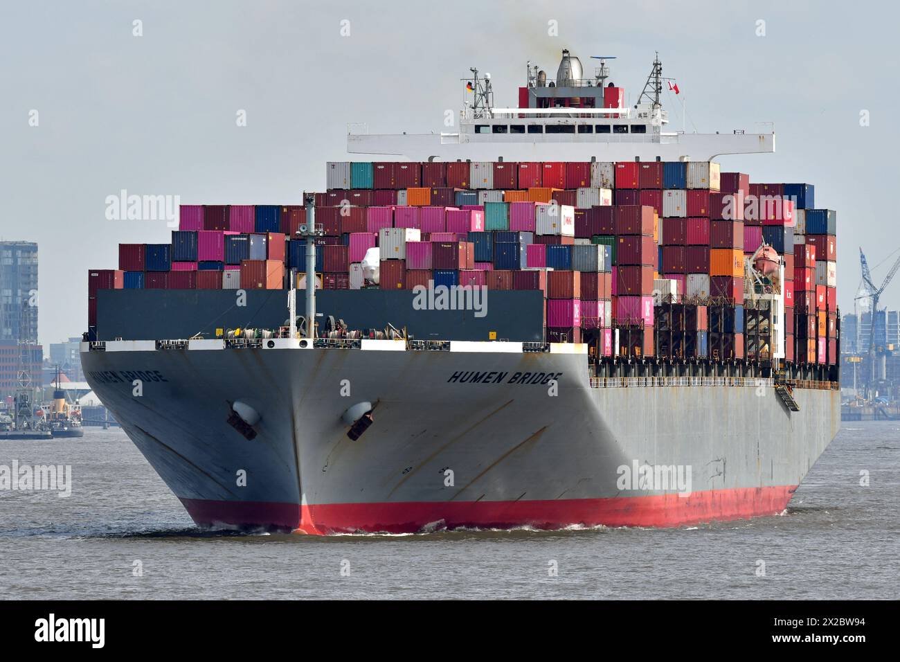 Containership HUMEN BRIDGE outbound from Hamburg Stock Photo