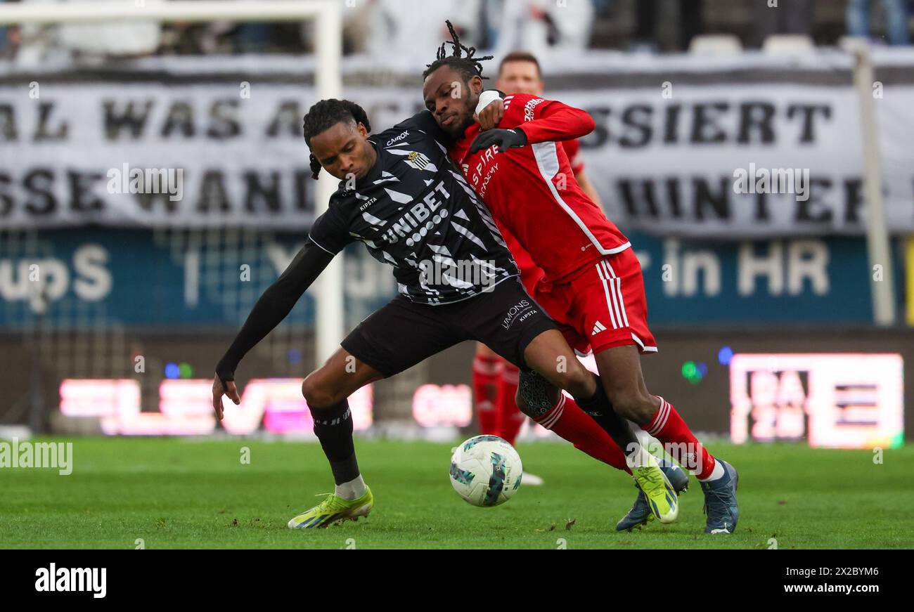Charleroi, Belgium. 21st Apr, 2024. Charleroi's Jeremy Petris and Eupen's Reagan Charles-Cook fight for the ball during a soccer match between Sporting Charleroi and KAS Eupen, Sunday 21 April 2024 in Charleroi, on day 3/6 of the 2023-2024 'Jupiler Pro League - Relegation Play-offs. BELGA PHOTO VIRGINIE LEFOUR Credit: Belga News Agency/Alamy Live News Stock Photo