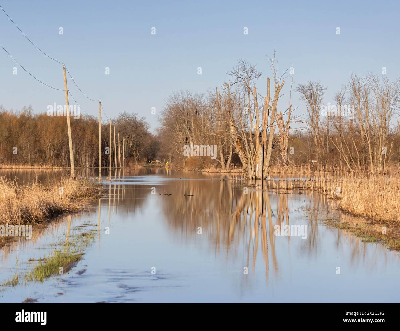 Impassable road due to  spring flooding in rural Minnesing Ontario Stock Photo