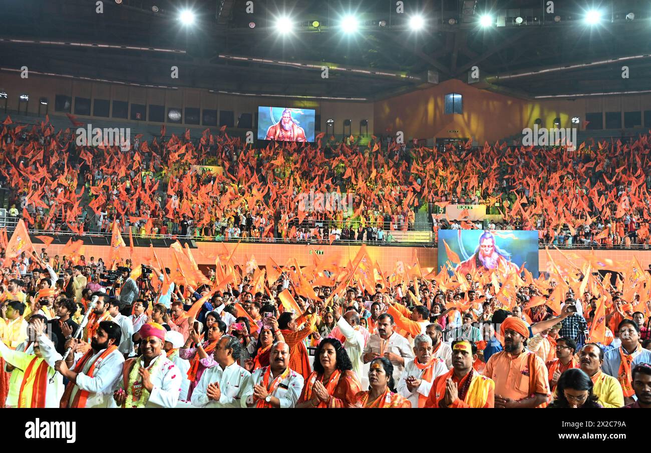 New Delhi, India. 21st Apr, 2024. NEW DELHI, INDIA - APRIL 21: BJP workers and supporters during offering Hanuman Chalisa at 'Hindu Nav Varsh' function at Indira Gandhi Indoor stadium on April 21, 2024 in New Delhi, India. Ahead of the Lok Sabha polls in the national capital, the Delhi BJP hosted a mega conclave of Hindu priests, saints and seers to celebrate the Hindu new year and construction of the Ram temple in Ayodhya, at the IGI stadium. (Photo by Arvind Yadav/Hindustan Times/Sipa USA ) Credit: Sipa USA/Alamy Live News Stock Photo