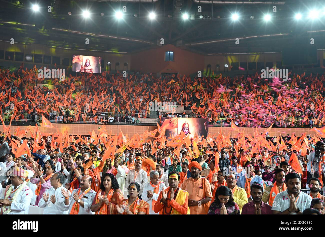 New Delhi, India. 21st Apr, 2024. NEW DELHI, INDIA - APRIL 21: BJP workers and supporters during offering Hanuman Chalisa at 'Hindu Nav Varsh' function at Indira Gandhi Indoor stadium on April 21, 2024 in New Delhi, India. Ahead of the Lok Sabha polls in the national capital, the Delhi BJP hosted a mega conclave of Hindu priests, saints and seers to celebrate the Hindu new year and construction of the Ram temple in Ayodhya, at the IGI stadium. (Photo by Arvind Yadav/Hindustan Times/Sipa USA ) Credit: Sipa USA/Alamy Live News Stock Photo