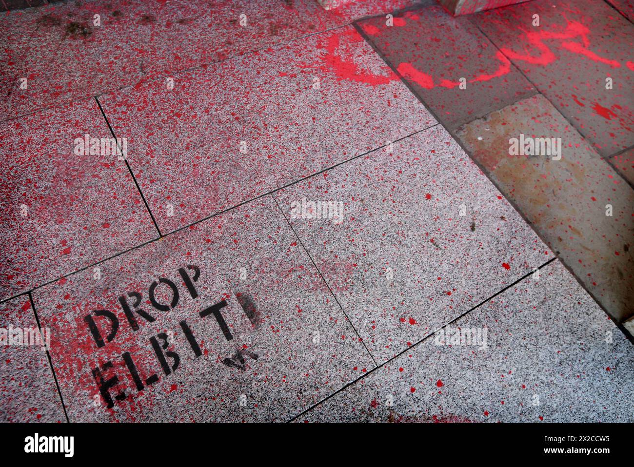 Red paint coats the floor at the entrance of County Hall and the words ‘Drop Elbit’ can be seen sprayed on the floor. Activists from Palestine Action leave the exterior of the County Hall building covered in red paint and graffiti after the nighttime attack. This is the third action in the space of a month. The protesters demand that Somerset Council terminate the lease on office space they let to Elbit Systems in Aztec West, Bristol. They argue that weapons made by Elbit Systems in the UK are being used by the Israel  Defence Force against Palestinians in Gaza and elsewhere. Israeli bombing i Stock Photo