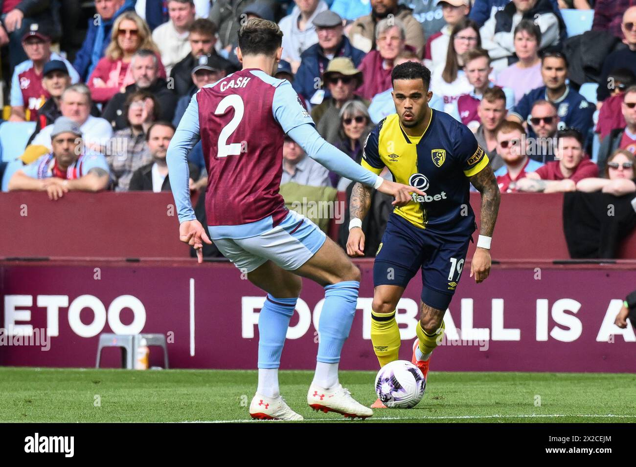 Justin Kluivert of Bournemouth takes on Matty Cash of Aston Villa during the Premier League match Aston Villa vs Bournemouth at Villa Park, Birmingham, United Kingdom, 21st April 2024  (Photo by Craig Thomas/News Images) Stock Photo