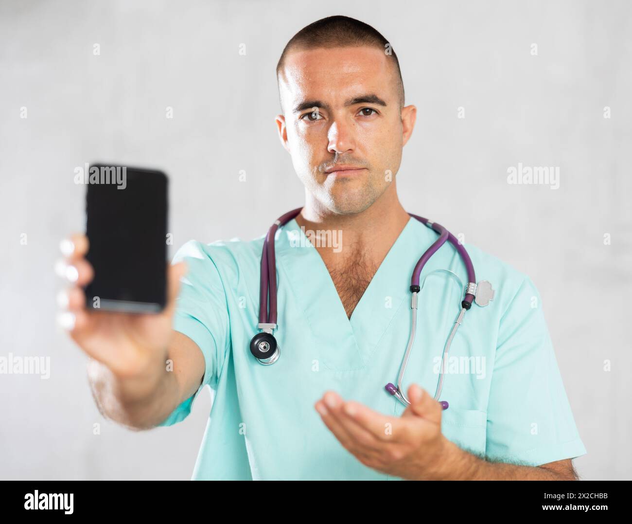 Doctor employs modern communication Stock Photo