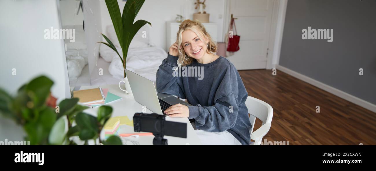 Portrait of female social media influencer recording lifestyle content video