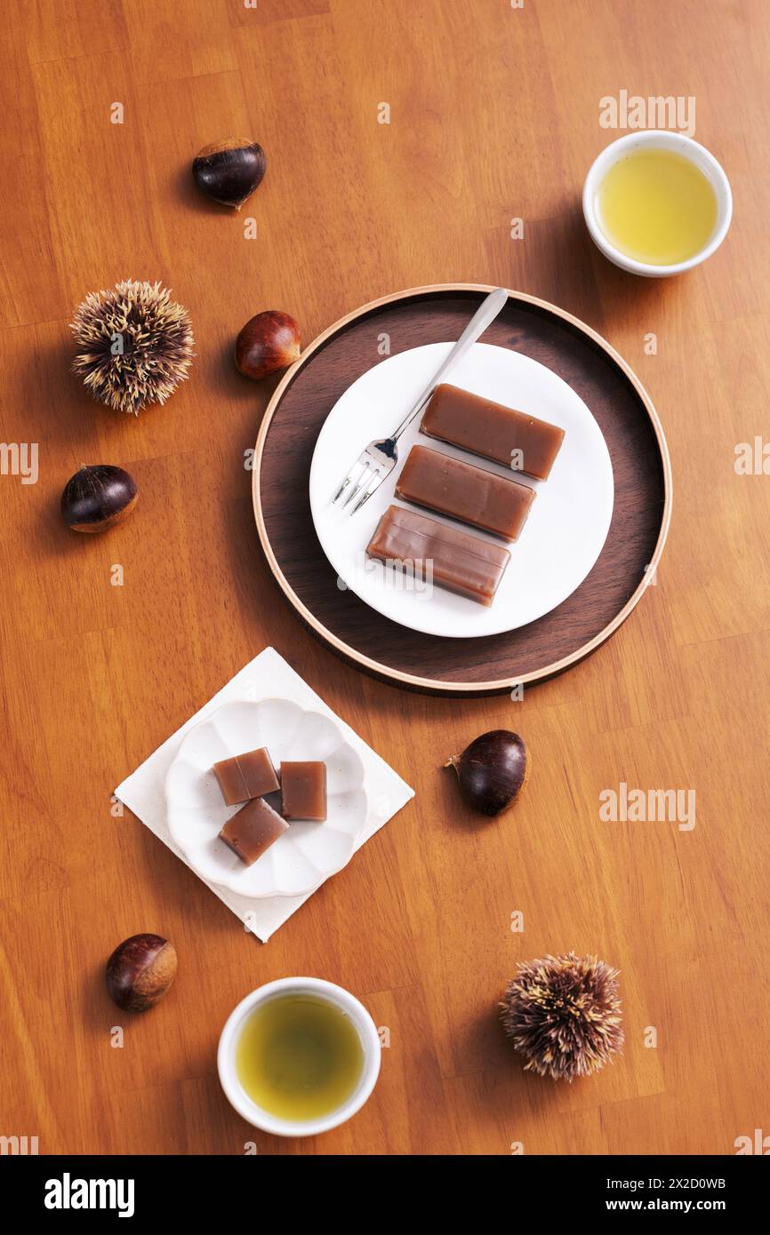 Chestnut pine nuts on the table, chestnut sweet potato dessert and tea Stock Photo