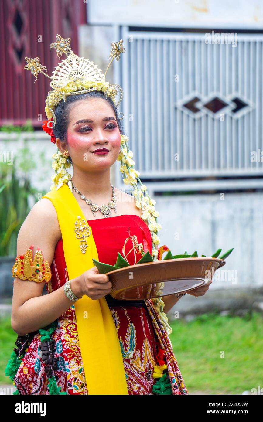 Sharing food on Kirab ketupat. Kirab ketupat is a celebration of Eid al