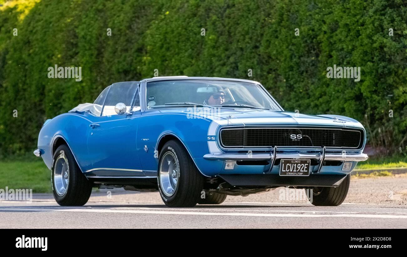 Bicester,UK- Apr 21st2024: 1967 Chevrolet Camaro classic car driving on a British road Stock Photo