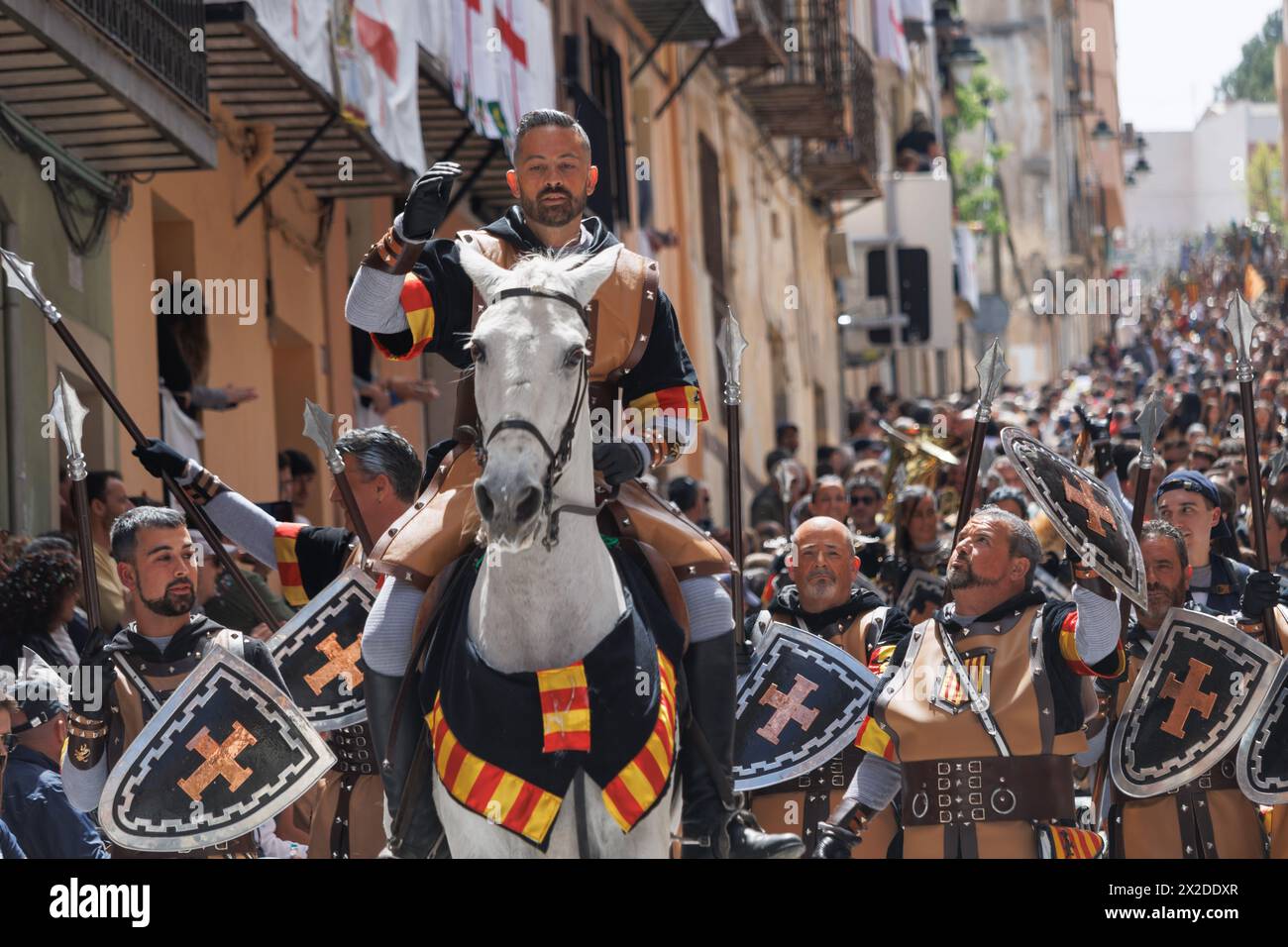 Alcoy, Spain, 04-20-2024: Squadron of the Aragoneses troupe with its corporal in front in the Moors and Christians parade of Alcoy, a festival of inte Stock Photo