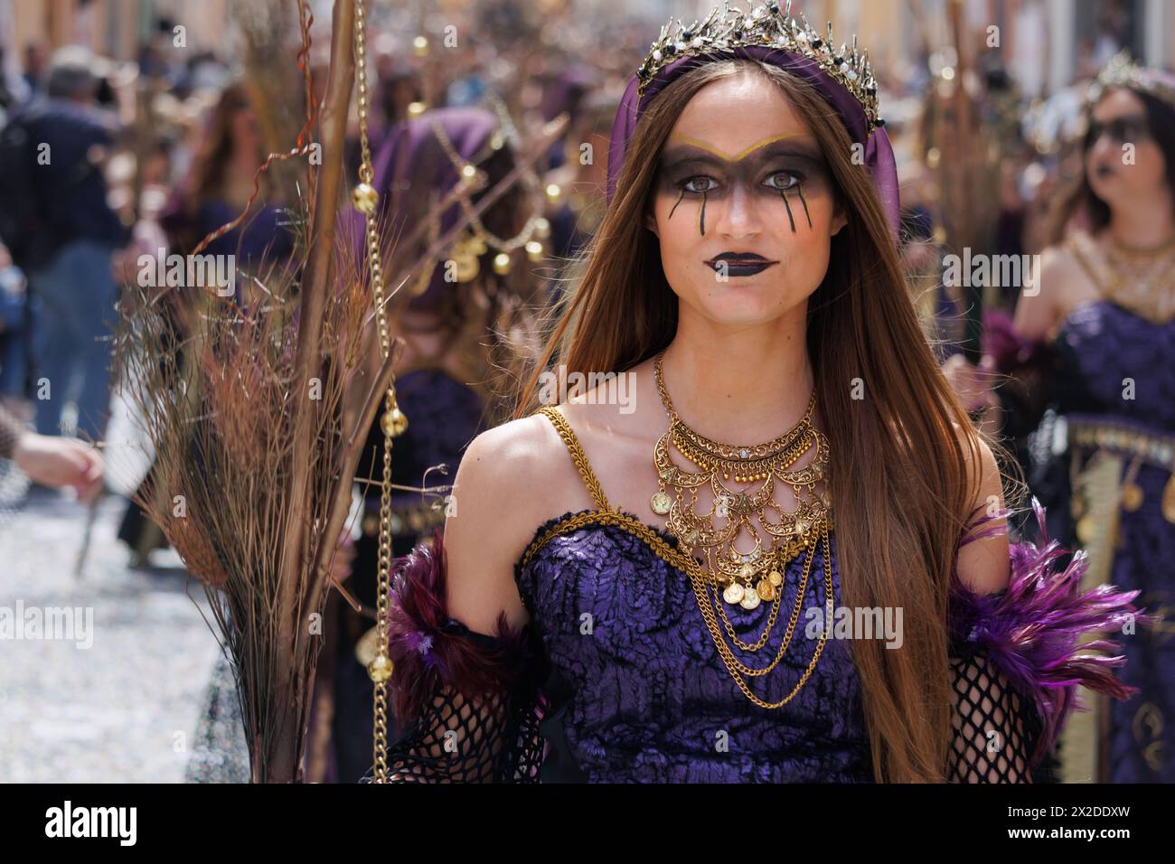 Alcoy, Spain, 04-20-2024: Spectacular easy makeup of a warrior woman from the Aragoneses troupe group in the Moors and Christians parade of Alcoy, a f Stock Photo