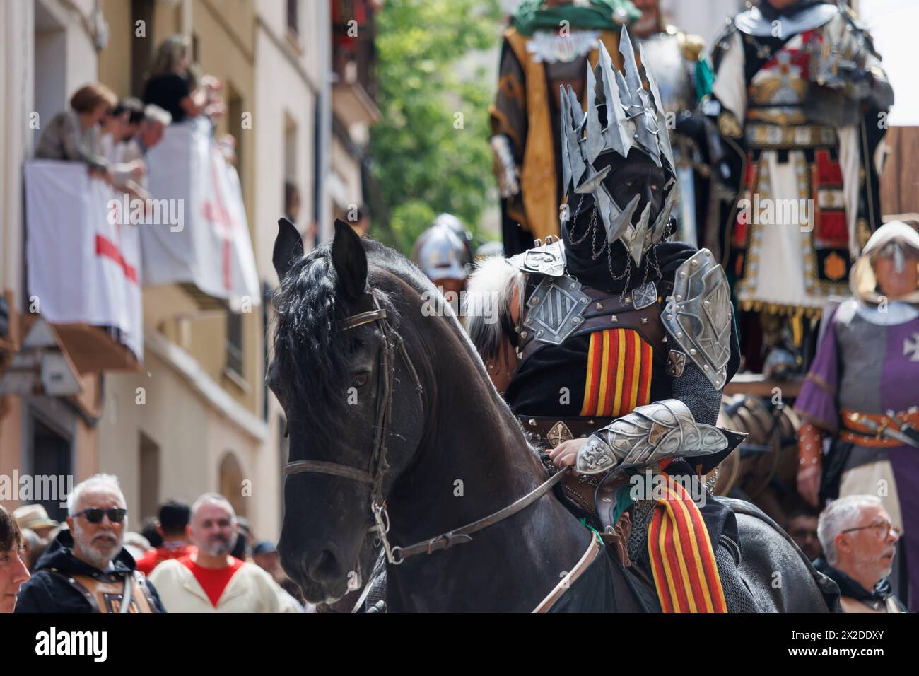 Alcoy, Spain, 04-20-2024: Warrior on horseback of pageantry in the Aragoneses troupe group in the Moors and Christians parade of Alcoy, a festival of Stock Photo