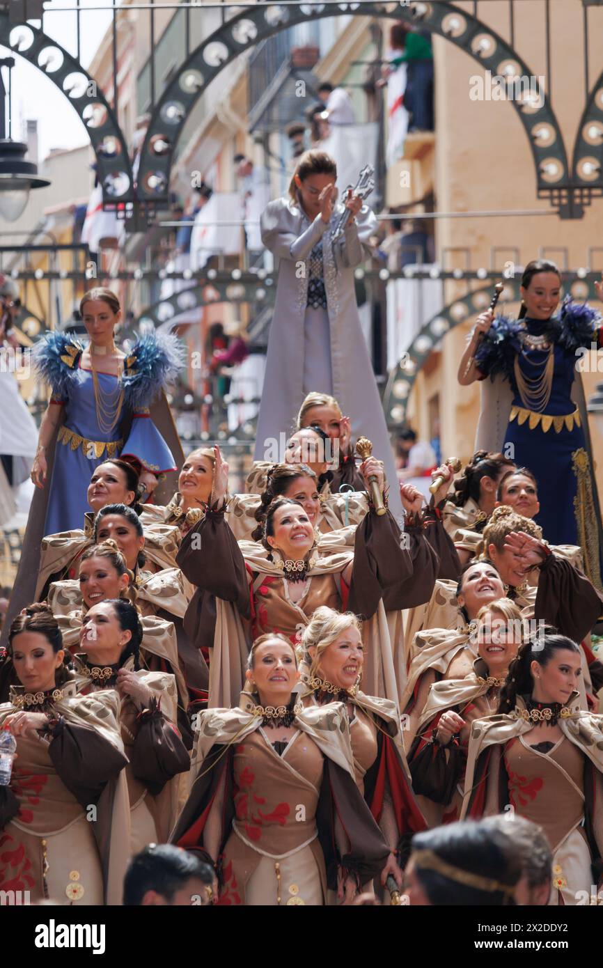 04-20-2024, Alcoy, Spain: Float of the favorite woman of the ensign of the Aragoneses troupe with her accompanying ladies during the parade of Moors a Stock Photo