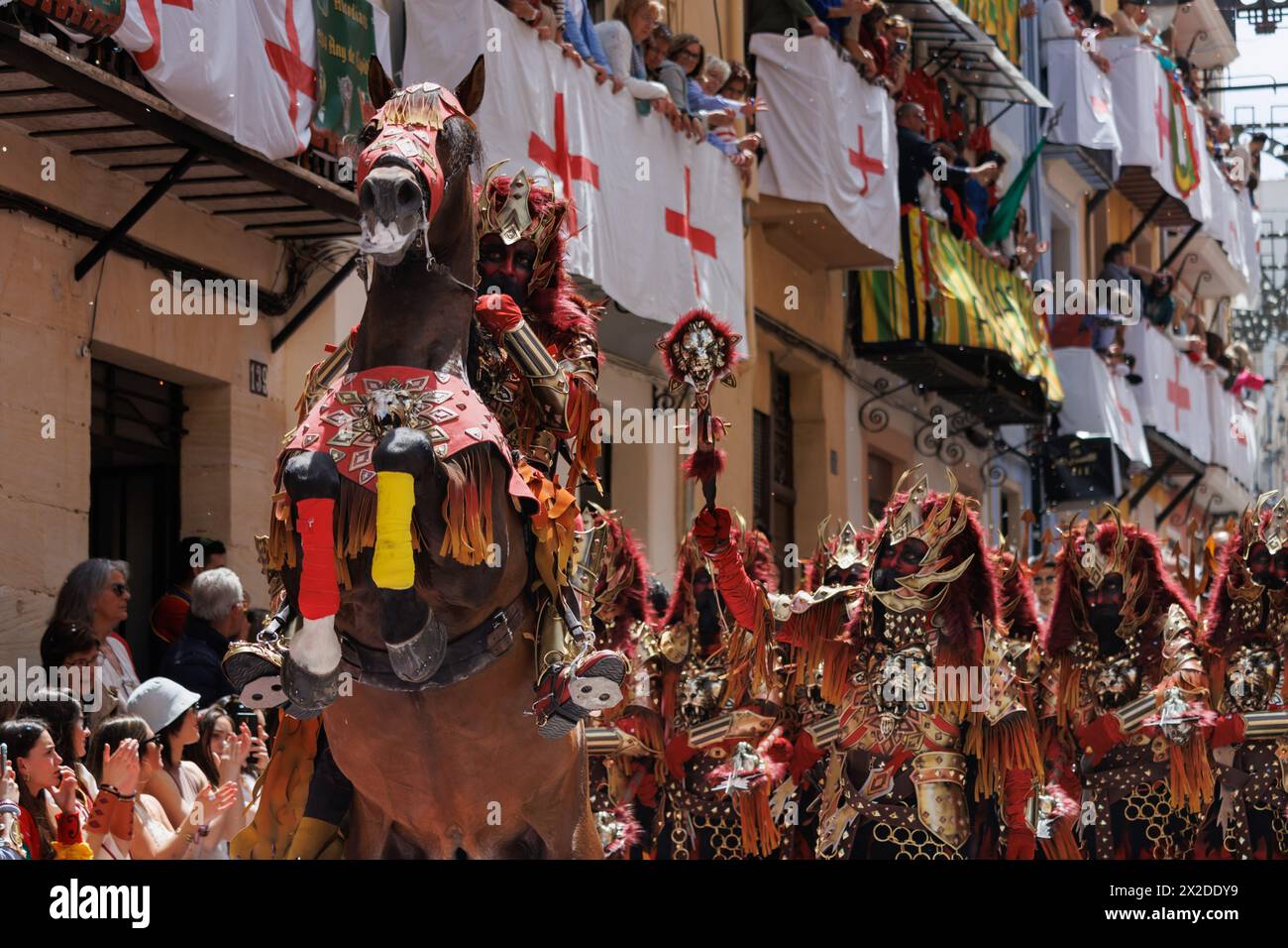 04-20-2024, Alcoy, Spain: Warriors of the Christian alferez with horse rampant in the parade. Popular festivals declared of international tourist inte Stock Photo