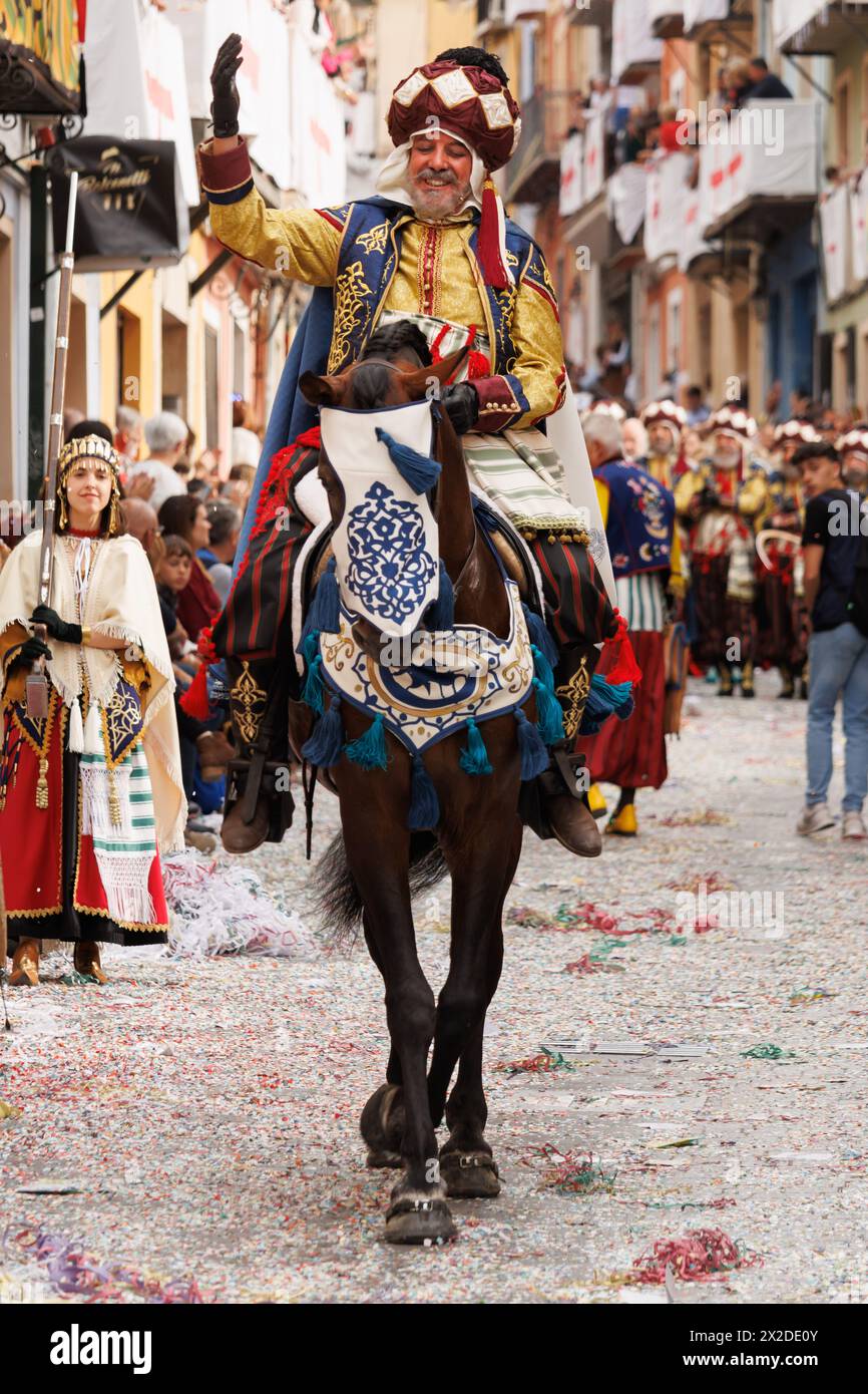 Alcoy, Spain, 04-20-2024: Rider and his horse with the special costume of the Ligeros in the Moors and Christians parade on its 150th anniversary Stock Photo