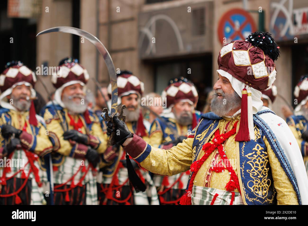 Alcoy, Spain, 04-20-2024: War squad with the special costume of the Ligeros in the Moors and Christians parade on its 150th anniversary Stock Photo