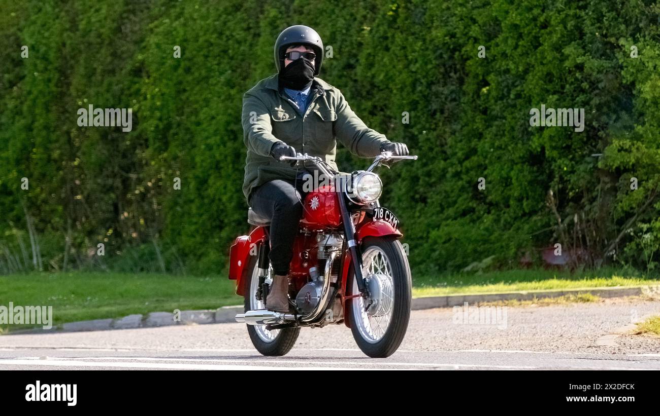 Bicester,UK- Apr 21st2024: 1962 red BSA 350 cc classic motorcycle on a British road Stock Photo