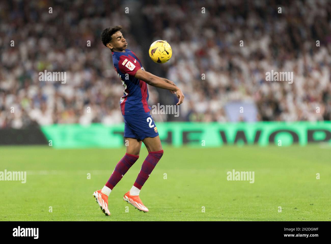 Madrid, Spain. 21st Apr, 2024. Lamine Yamal of Barcelona in action during the La liga 2023/24 match between Real Madrid and FC Barcelona at Santiago Bernabeu Stadium. Final score; Real Madrid 3:2 FC Barcelona Credit: SOPA Images Limited/Alamy Live News Stock Photo
