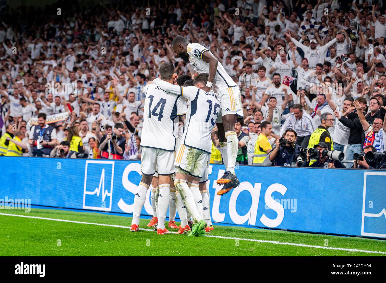 Madrid, Spain. 21st Apr, 2024. Jude Bellingham of Real Madrid seen celebrating his goal with his teammates (from L to R) Jose Luis Sanmartin Mato (Joselu), Federico Valverde, Lucas Vazquez and Antonio Rudiger during the La Liga EA Sports 2023/24 football match between Real Madrid vs FC Barcelona at Estadio Santiago Bernabeu. Real Madrid 3 : 2 FC Barcelona Credit: SOPA Images Limited/Alamy Live News Stock Photo