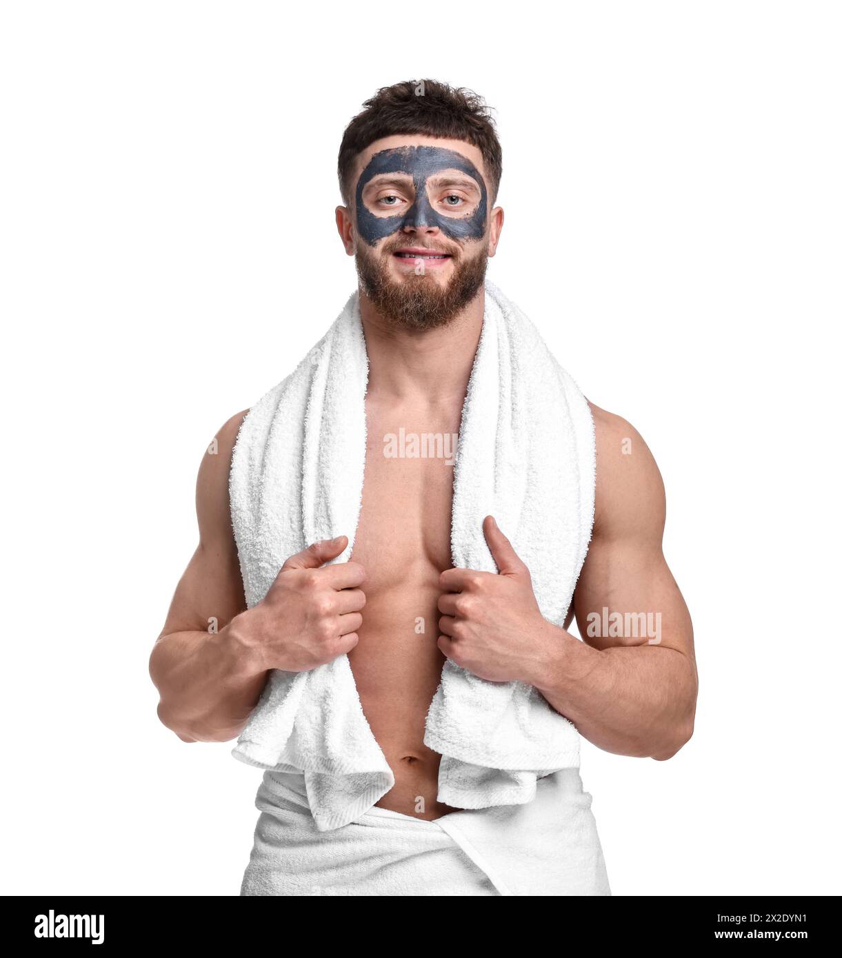 Handsome man with clay mask on his face against white background Stock ...