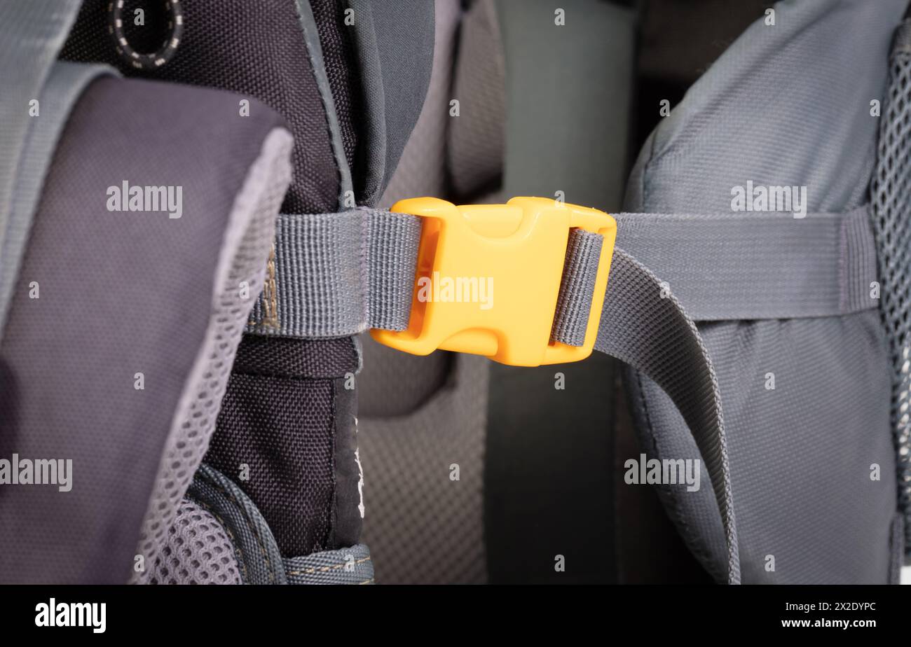 Yellow plastic clasp of backpack, full frame image Stock Photo