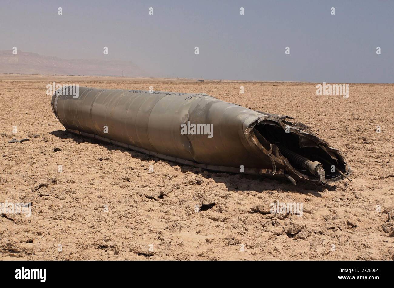 The remains of an Iranian ballistic missile that was intercepted over Israel during the Iranian assault found in the shore of the Dead Sea, Israel. The Emad missile's 500-kilogram (1,100-lb) warhead had flown over 1,500 kilometers from Iran to Israel in 12 minutes and was one of 120 ballistic missiles fired at Israel. Stock Photo