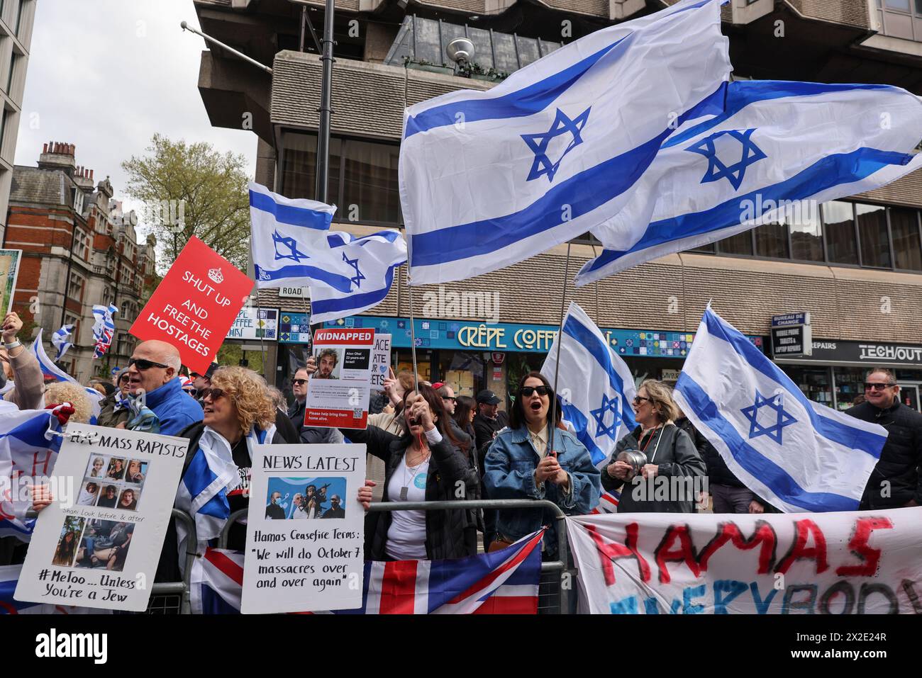 London, UK. 20th Apr, 2023. Pro-Israel supporters wave flags as they stage a counter protest during a pro-Palestine demonstration outside Barclays bank on Tottenham Court Road in London as the Israel - Hamas war continues. Credit: SOPA Images Limited/Alamy Live News Stock Photo